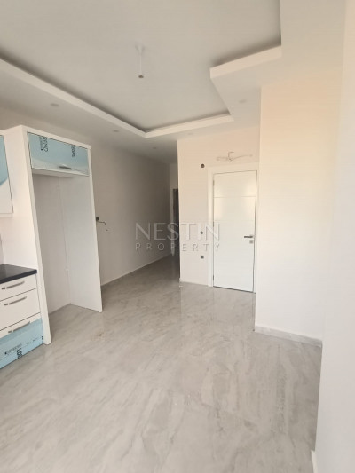 Квартира 1+1 в центре Алании с видом на горы фото 15