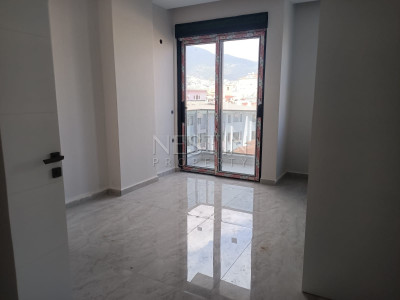 Квартира 1+1 в центре Алании с видом на горы фото 16