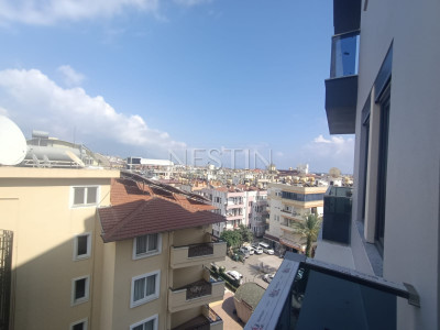 Квартира 1+1 в центре Алании с видом на горы фото 17