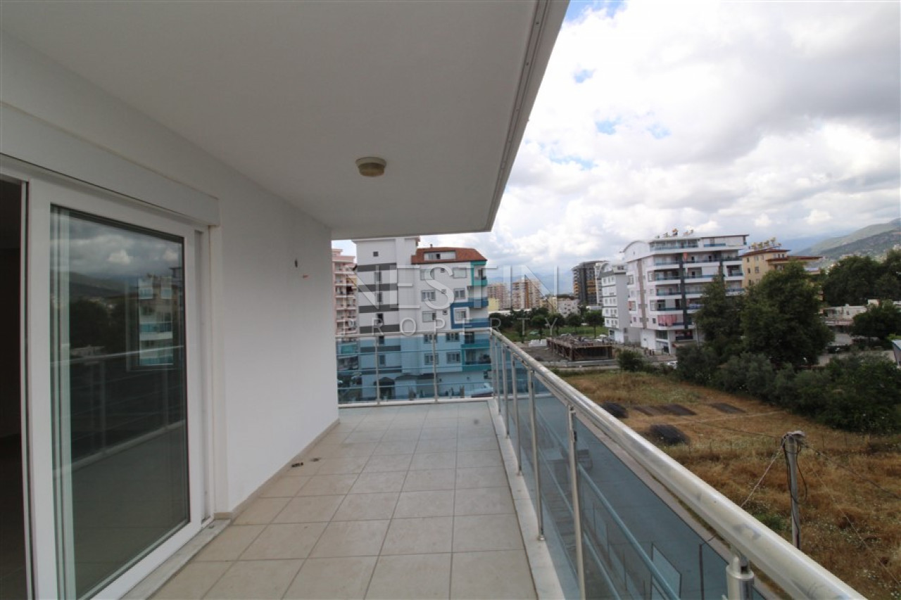 Просторная квартира 2+1 в районе Махмутлар с видом на горы фото 26