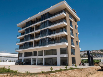 Квартиры планировкой 1+1 и 2+1 в новом жилом комплексе в районе Каргыджак фото 1