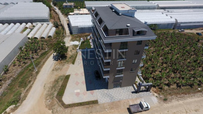 Квартиры планировкой 1+1 и 2+1 в новом жилом комплексе в районе Каргыджак фото 4