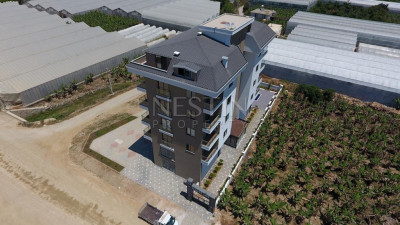 Квартиры планировкой 1+1 и 2+1 в новом жилом комплексе в районе Каргыджак фото 5