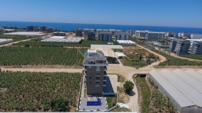 Квартиры планировкой 1+1 и 2+1 в новом жилом комплексе в районе Каргыджак фото 9