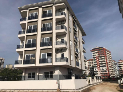 Новая квартира 1+1 в районе Махмутлар в 350 м от моря фото 1