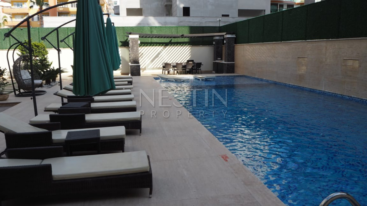 Светлая просторная квартира 1+1 в районе Оба, в 100 м от моря фото 10