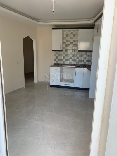 Бюджетное предложение квартиры 1+1 в районе Махмутлар фото 4