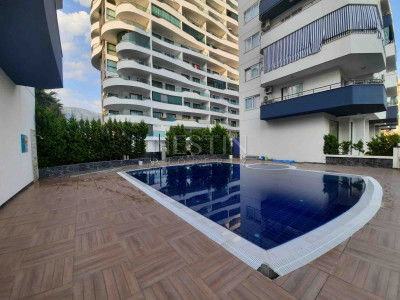 Квартира 1+1 в районе Махмутлар с видом на море фото 2