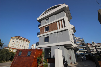 Квартира 1+1 в доме городского типа в районе Оба с видом на горы фото 1