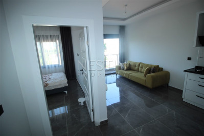 Квартира 1+1 в доме городского типа в районе Оба с видом на горы фото 8