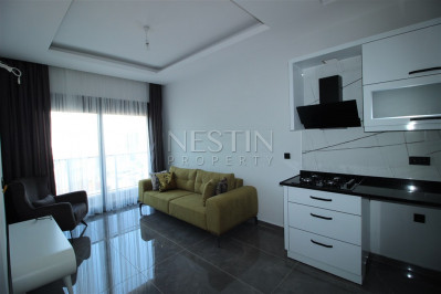 Квартира 1+1 в доме городского типа в районе Оба с видом на горы фото 10