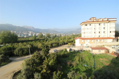 Квартира 1+1 в доме городского типа в районе Оба с видом на горы фото 12