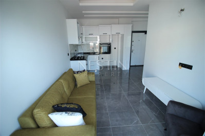 Квартира 1+1 в доме городского типа в районе Оба с видом на горы фото 14