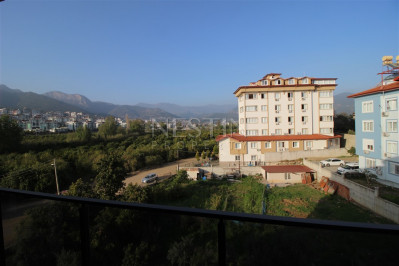 Квартира 1+1 в доме городского типа в районе Оба с видом на горы фото 18