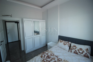 Квартира 1+1 в доме городского типа в районе Оба с видом на горы фото 20