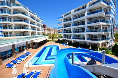 Квартира 1+1 с видом на горы, в комплексе с инфраструктурой, в районе Оба фото 1