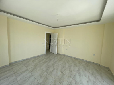 Квартира 2+1 в районе Мамхутлар с видом на море и горы фото 15