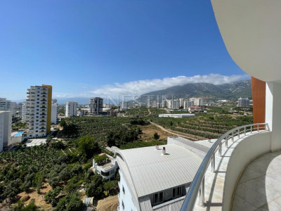 Квартира 2+1 в районе Мамхутлар с видом на море и горы фото 23