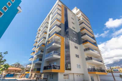 Квартира 1+1 в районе Махмутлар в новом жилом комплексе фото 1