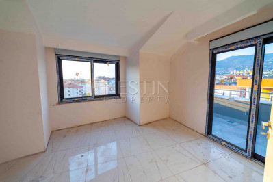 Пентхаус 2+1 в центре Аланьи с видом на горы и историческую крепость фото 9