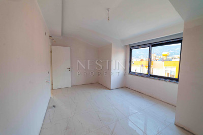 Пентхаус 2+1 в центре Аланьи с видом на горы и историческую крепость фото 11