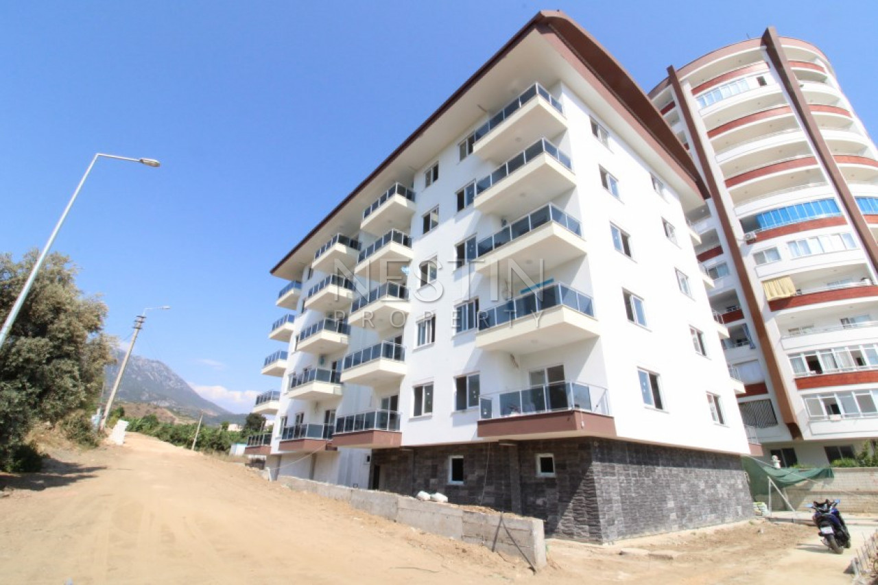 Квартира 1+1 в районе Махмутлар в новом жилом комплексе в 700 м от моря фото 1