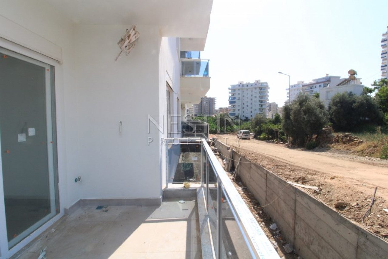 Квартира 1+1 в районе Махмутлар в новом жилом комплексе в 700 м от моря фото 12