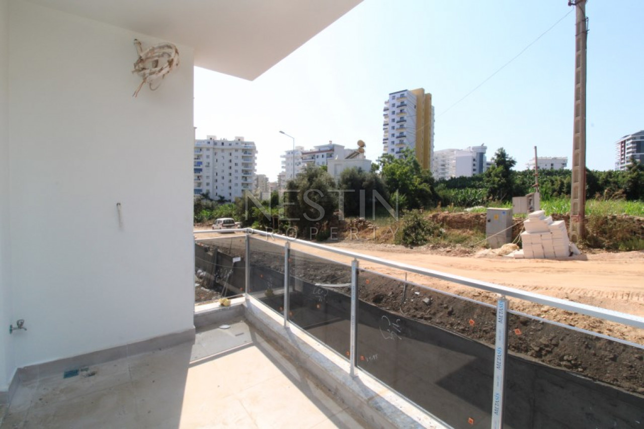 Квартира 1+1 в районе Махмутлар в новом жилом комплексе в 700 м от моря фото 14