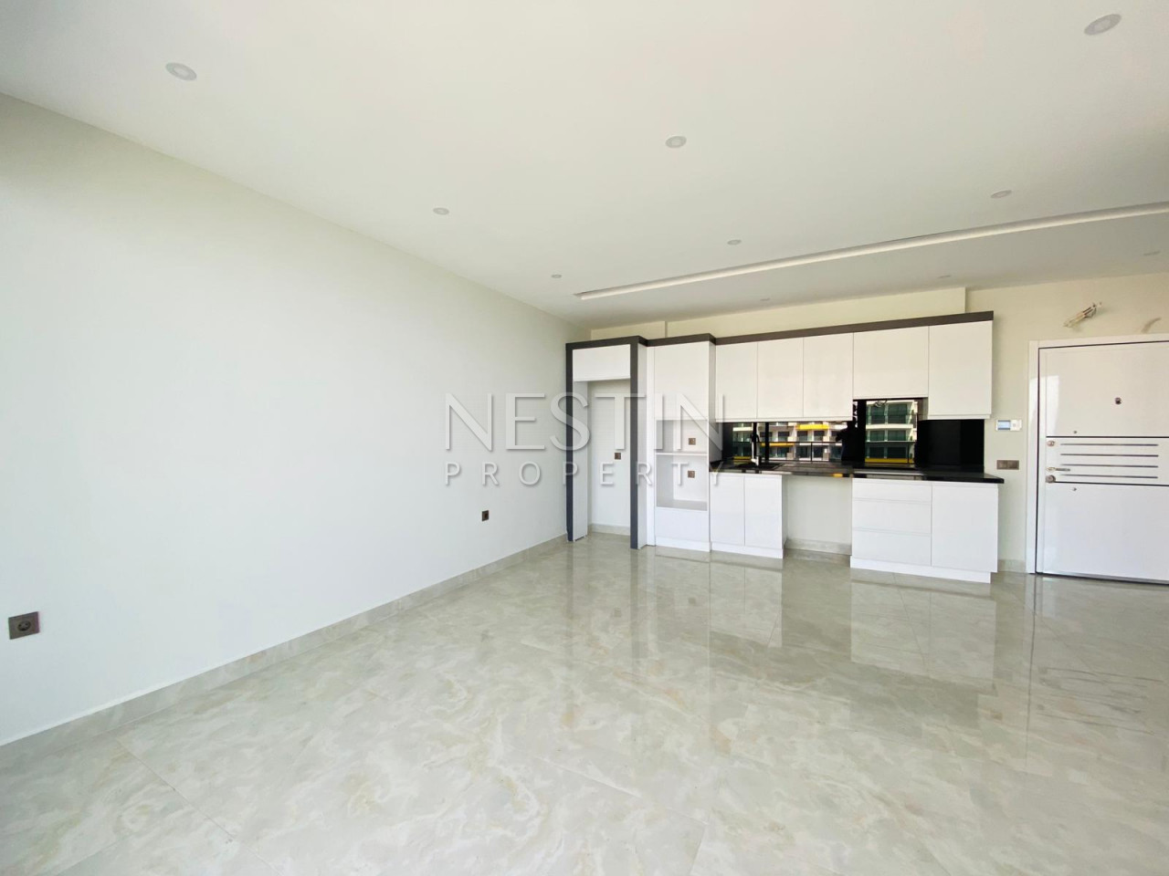 Квартира 1+1 в центре района Махмутлар с видом на море фото 11