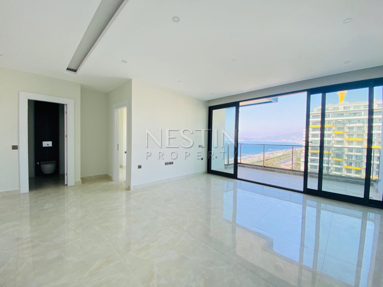 Квартира 1+1 в центре района Махмутлар с видом на море фото 13