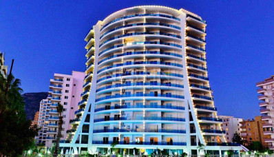 Квартира 1+1 в районе Махмутлар с красивым видом на море фото 1