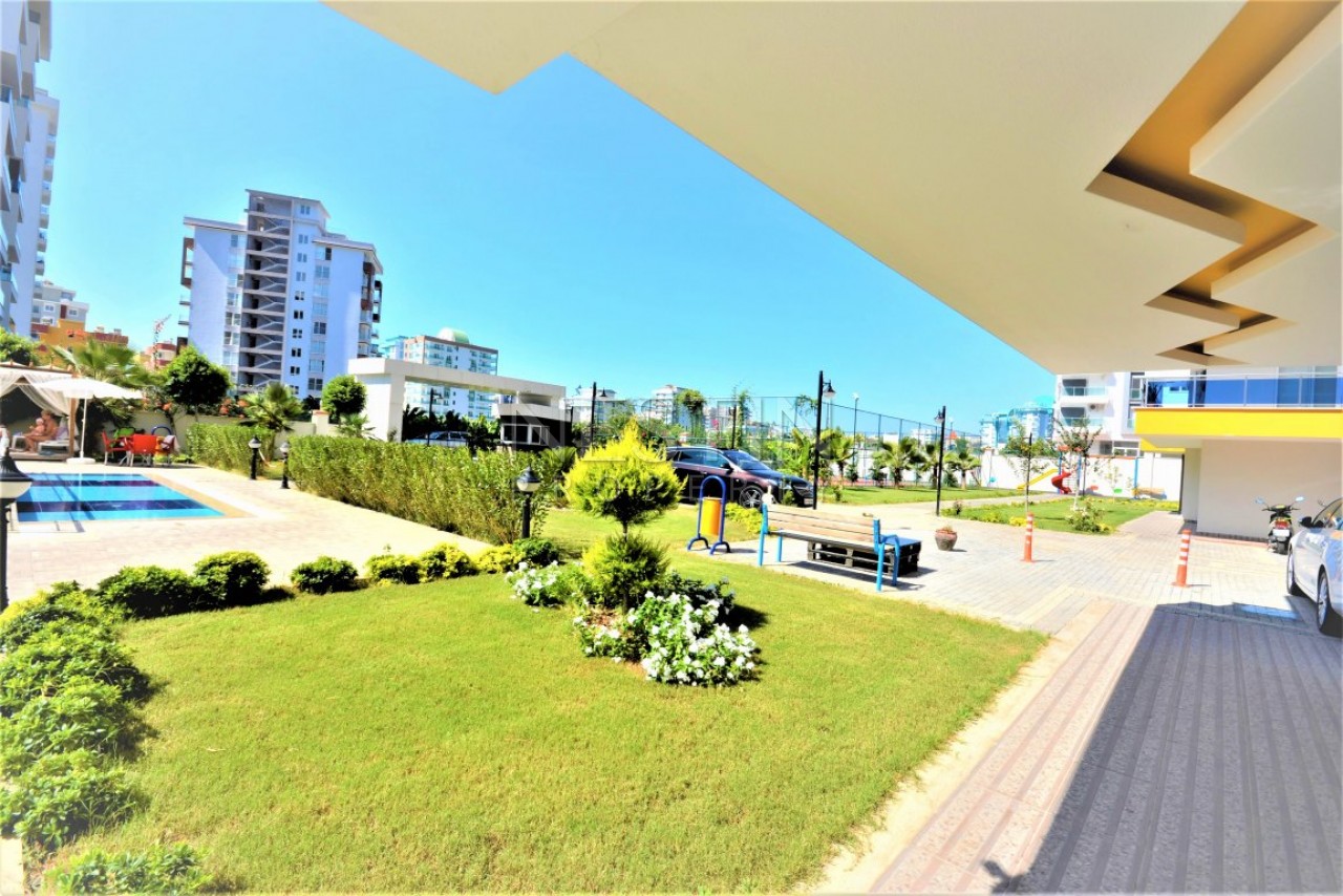 Просторная квартира в красивом комплексе в районе Махмутлар фото 10