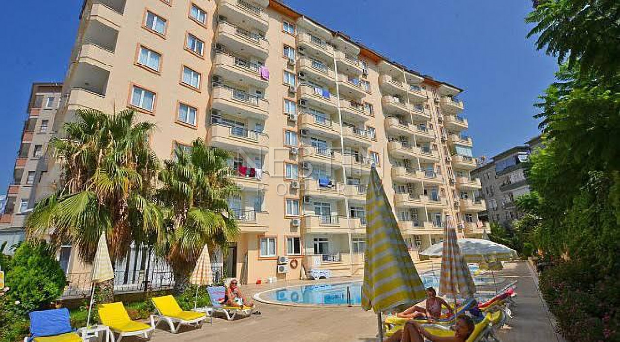 Уютная, светлая квартира 1+1 в центре города Аланья с видом на море и крепость фото 1