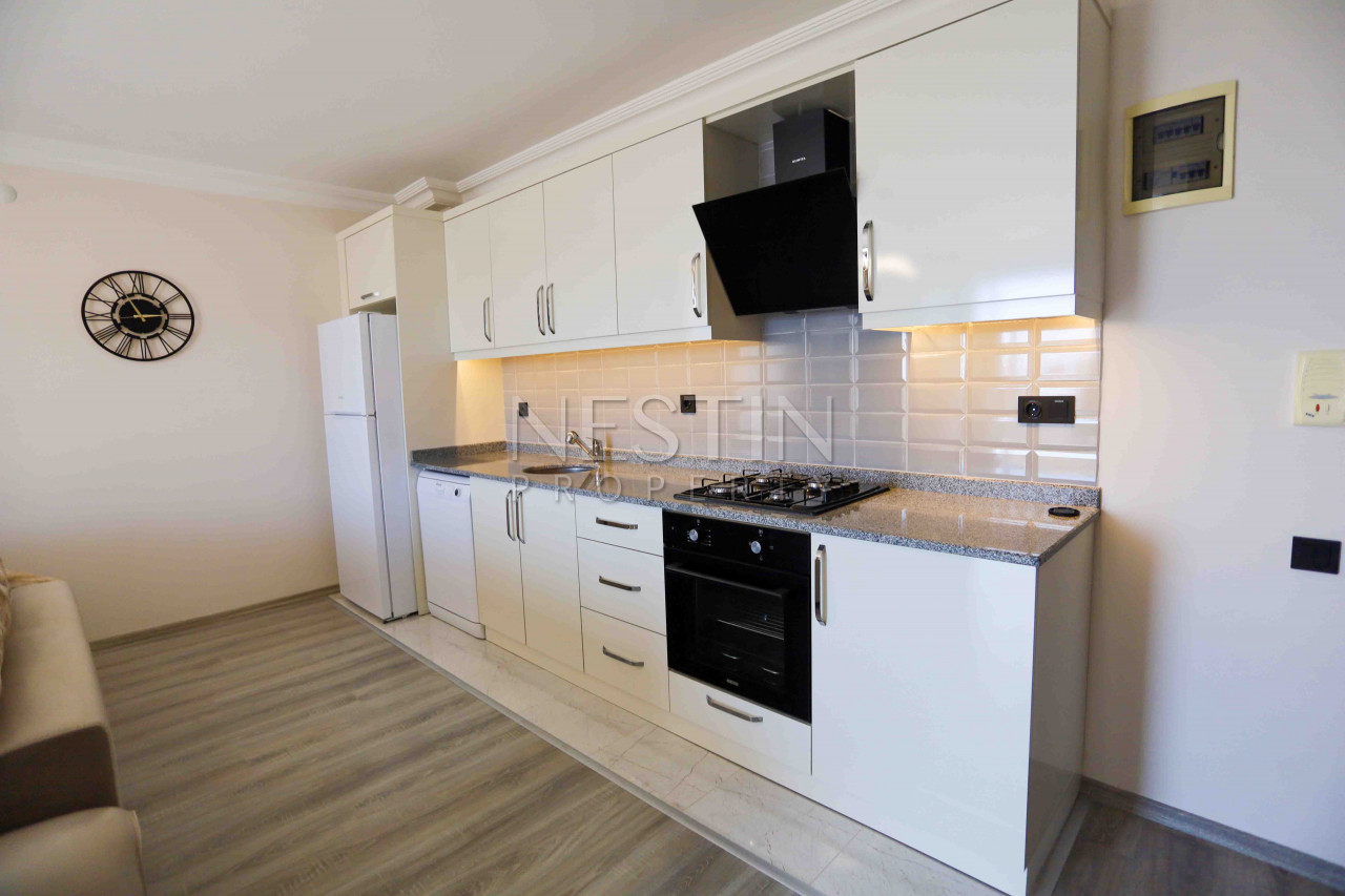 Уютная, светлая квартира 1+1 в центре города Аланья с видом на море и крепость фото 5