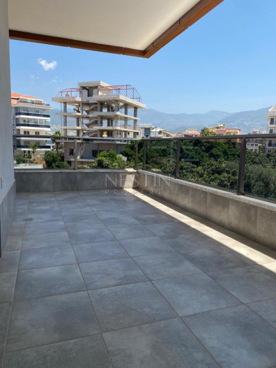 Уютная квартира 1+1 в районе Оба с видом на горы фото 39