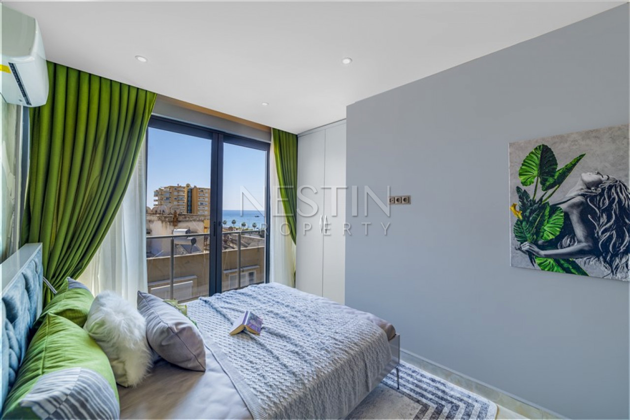 Дуплекс 1+1 в центре района Махмутлар с видом на море фото 18