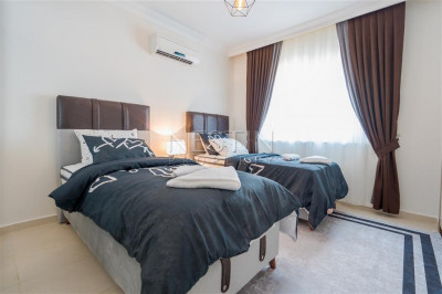 Уютная квартира 2+1 в районе Мамхутлар с видом на горы фото 12