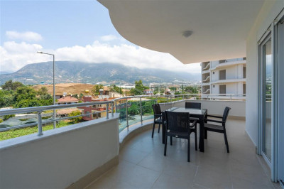 Уютная квартира 2+1 в районе Мамхутлар с видом на горы фото 19