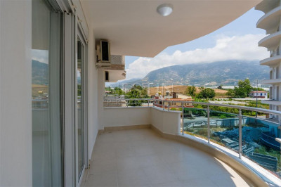 Уютная квартира 2+1 в районе Мамхутлар с видом на горы фото 22