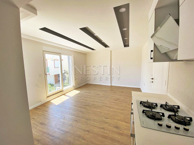 Уютная и светлая квартира 1+1 в районе Муратпаша фото 11