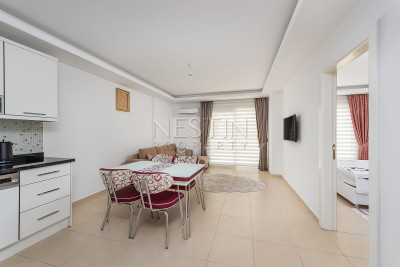 Уютная и светлая квартира 1+1 в районе Авсаллар фото 18