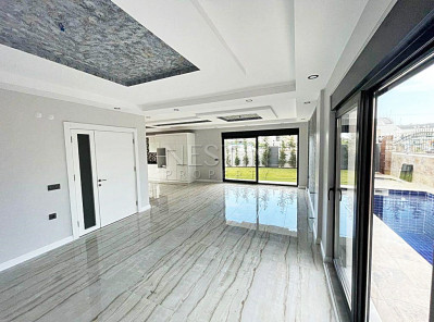 Новая и красивая вилла 5+1 в районе Лара с бассейном фото 33