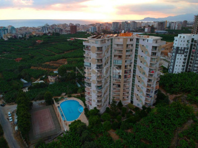 Квартира 2+1 в районе Махмутлар с видом на горы и море фото 2