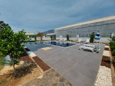 Квартира 1+1 в новом комплексе в районе Каргыджак в 300 м от моря фото 4