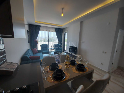 Квартира 1+1 в новом комплексе в районе Каргыджак в 300 м от моря фото 13