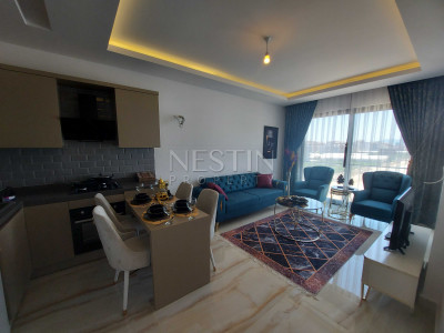 Квартира 1+1 в новом комплексе в районе Каргыджак в 300 м от моря фото 14