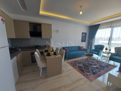 Квартира 1+1 в новом комплексе в районе Каргыджак в 300 м от моря фото 16