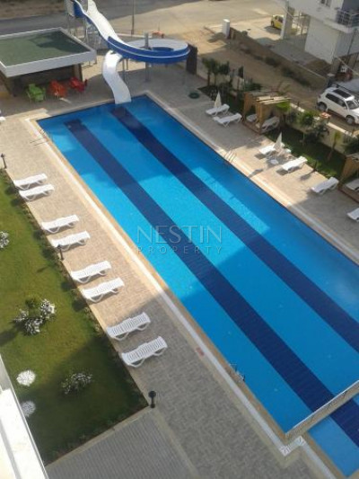 Квартира 1+1 в районе Махмутлар в комплексе с хорошей инфраструктурой фото 4