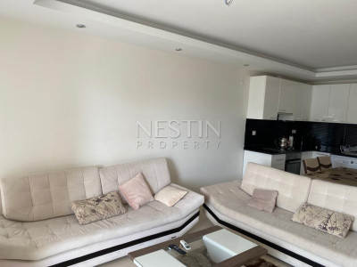 Квартира 1+1 в районе Джикджилли в хорошем жилом комплексе фото 16