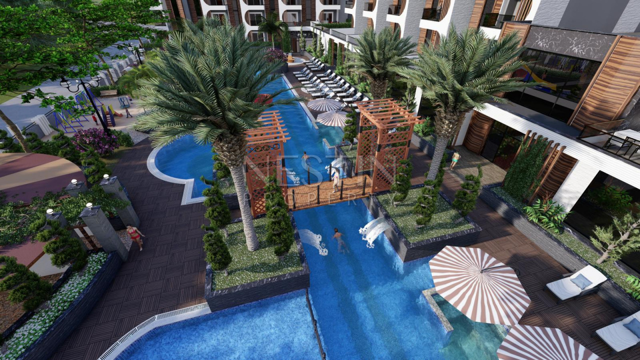 Новый шикарный комплекс, на стадии строительства в районе Авсаллар в 300 м от моря фото 12